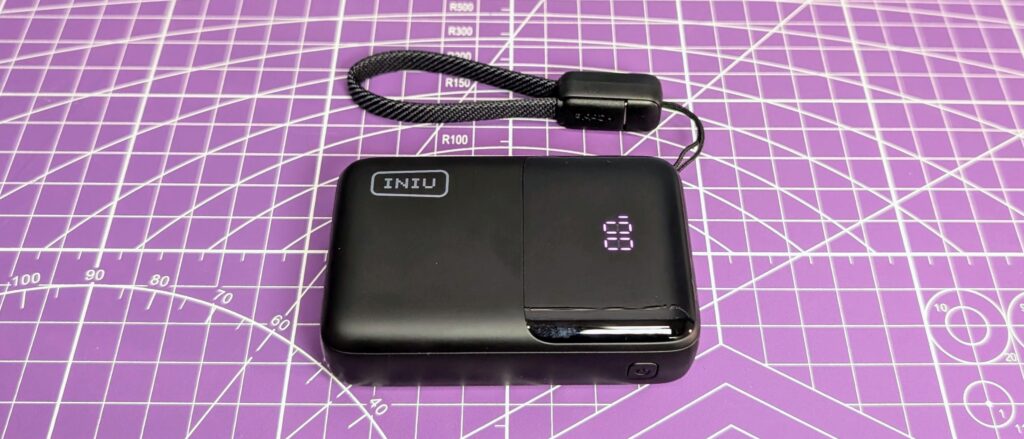 Iniu P50-E1 Power Bank has taken the pride of the place in my daily car